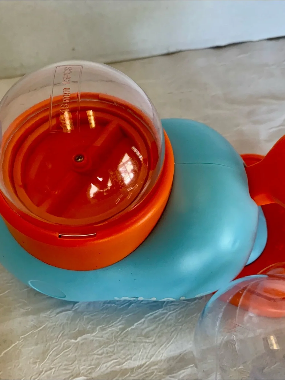 interactive whale-shaped treat dispenser and puzzle feeder for pets